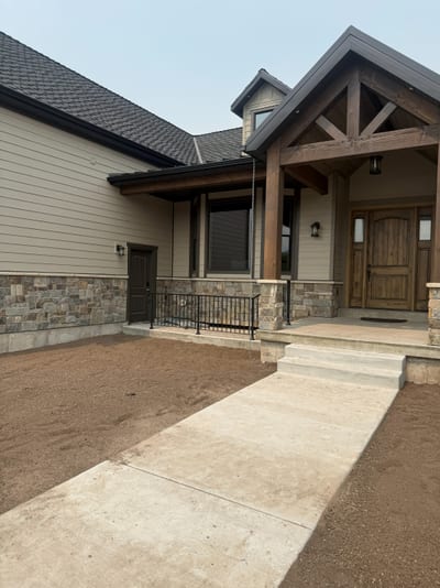 Grey-black ornamental steel railing.